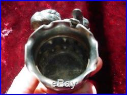 1800's Meriden # 54 toothpick holder Squirrel with glass eyes playing horn