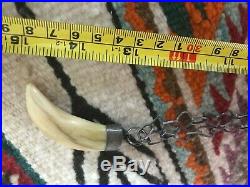 Antique handmade Navajo sterling necklace, with silver-capped claw, tooth, horn