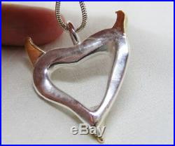 Devils heart pendant, chunky silver with gold horns, hallmarked, 9ct gold, uniqu