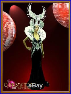 Exotic beaded illusion gown with matching silver Horn headdress and backpack