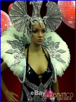 Exotic beaded illusion gown with matching silver Horn headdress and backpack