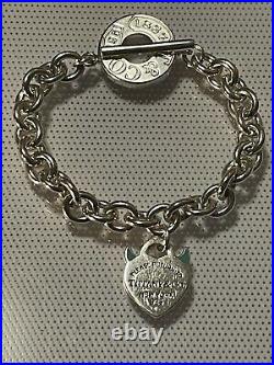 Please Return to Tiffany and Co. 925 heart with devil horns toggle bracelet