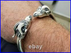 Silver bracelet with ram heads and long horns