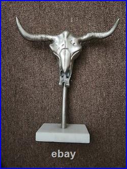 Silver toned metal bull / cow skull with horns table top decoration stone base