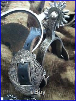 Used Ladies Fleming Sterling Silver Spurs and straps with Broken Horn Buckles