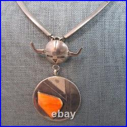 VINTAGE SOUTHWEST SPINY OYSTER NECKLACE WITH SOLID SIDES AND SUN FACE With HORNS