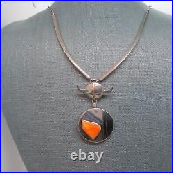 VINTAGE SOUTHWEST SPINY OYSTER NECKLACE WITH SOLID SIDES AND SUN FACE With HORNS