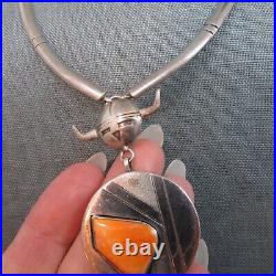 VINTAGE SOUTHWEST SPINY OYSTER NECKLACE WITH SOLID SIDES AND SUN FACE With HORNS