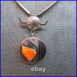 VINTAGE SOUTHWEST SPINY OYSTER NECKLACE WITH SOLID SIDES AND SUN FACE With HORNS