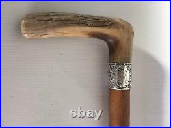 VINTAGE WALKING STICK WITH ANTLER HORN HANDLE AND SILVER CHASED BAND c1886