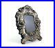 Victorian-Style-Sterling-Silver-Picture-Frame-with-Woman-and-Cherub-Playing-Horn-01-ze