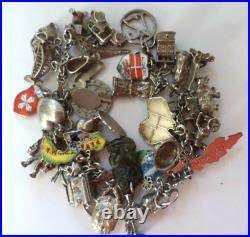 Vintage Silver Bracelet with 33 Charms World Wide Collection Circa 1950s