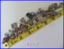 Vintage Silver Bracelet with 33 Charms World Wide Collection Circa 1950s