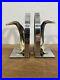 Vintage-Unique-Chrome-Bookends-With-Carved-Horn-Penguins-01-zx
