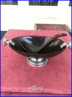 Water buffalo horn caviar dish with sterling silver mold